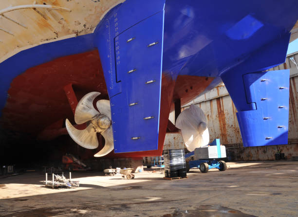 istock Propeller under reconstruction. Under the ship. Big ship under repairing on dry dock 1009421566