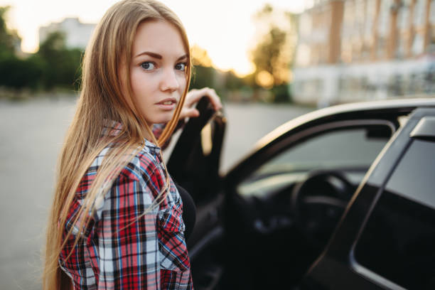 istock Female driver beginner sitting in a car 1009427288