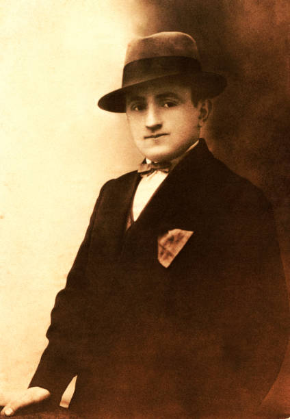 istock Old photograph of a man with a hat 1009429184