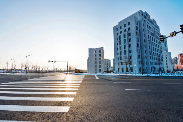 istock Zebra crossing and modern buildings in winter 1009431096
