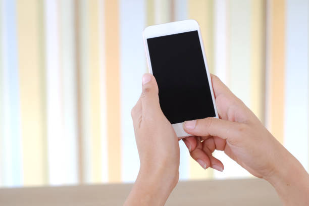 istock Hand woman using smartphone .Colorful background 1009435876