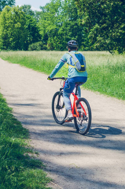 istock The cyclist in motion riding bicycle road 1009436252