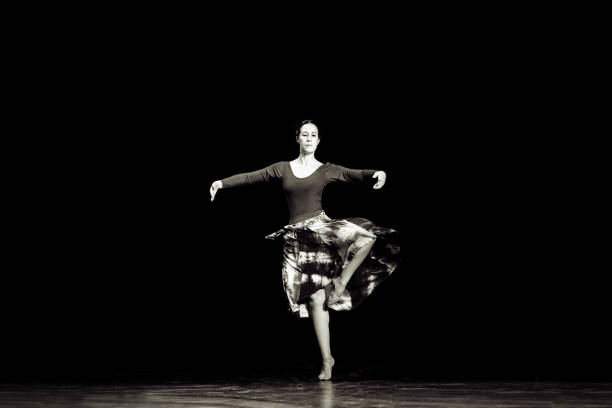 istock Middle aged woman dancing ballet 1009445284