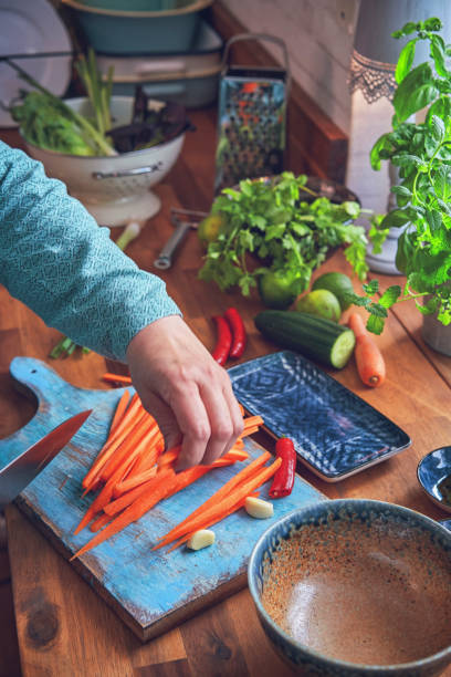 Preparing Spring Rolls with Vegetables and Shrimps