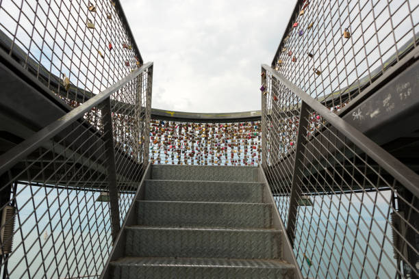 Many different engraved love, padlocks at the railing on the \