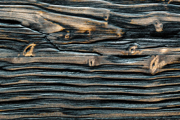 istock Dark vintage shabby wooden board 1009448660