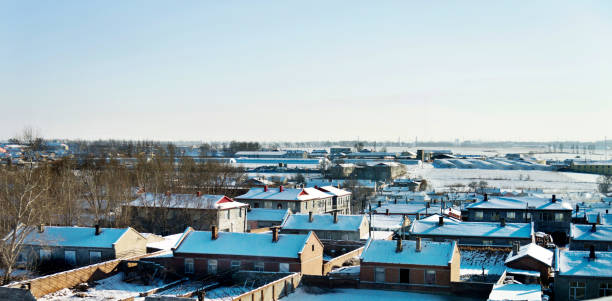 istock Roofs covering with snow at winter 1009457124