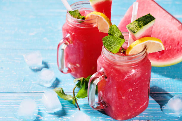 istock Watermelon Mojito with mint, rum, ice and lemons with copyspace 1009461646