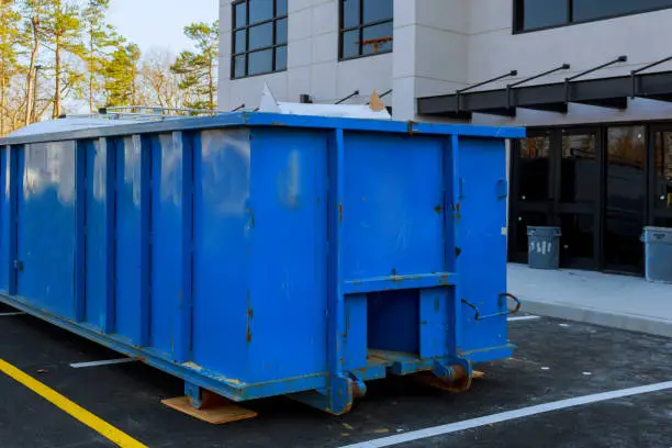 Dumpsters being full with garbage container trash on ecology and environment