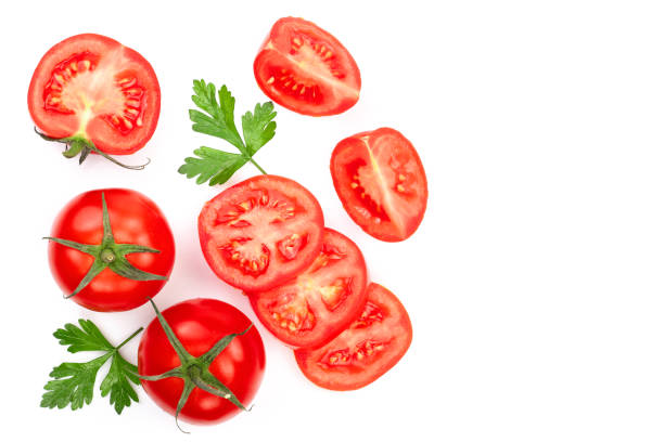 istock tomatoes with parsley leaves with copy space for your text isolated on white background. Top view. Flat lay 1009467874