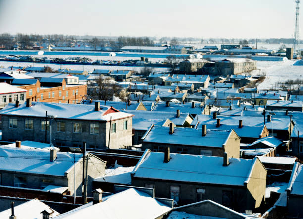 istock Roofs covering with snow at winter 1009478086
