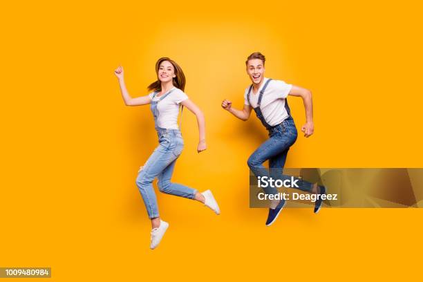 Summer Dreamy Student Freedom Fly Teen Age Youth Person Concept Side View Full Size Length Photo Portrait Of Two Cheerful Rejoicing Attractive Handsome Guy Lady Making Movement Isolated Background Stock Photo - Download Image Now