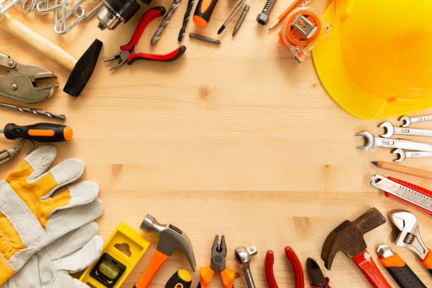 istock Labor day background concept.Variety of tools on wooden background with copy space for text.Top view of hand tools on a wooden table for labor day promotion 1009483804