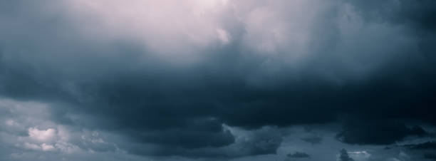 istock Clouds in the dark sky of the sky. Monochrome image. 1009486772