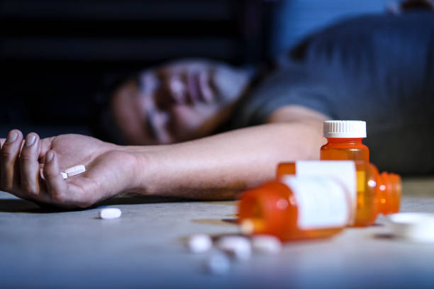Crime Scene: Man dies from prescription drug overdose. Crime Scene: man dies from prescription drug overdose. Opioid addiction themes. self mutilation pictures stock pictures, royalty-free photos & images