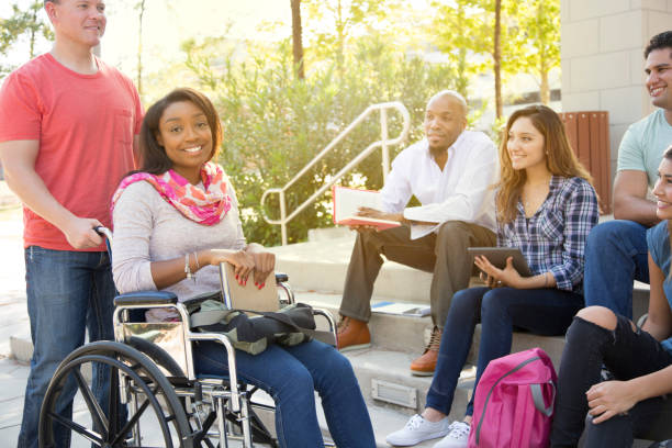 istock College student friends talking together on university campus. 1009499480