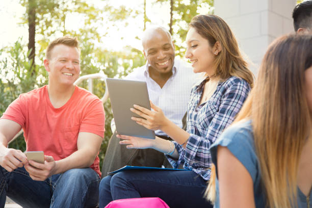 istock College student friends study together on university campus. 1009499520