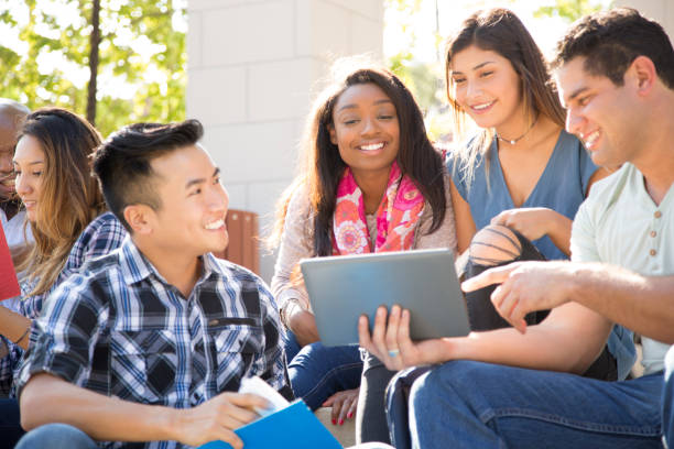 istock College student friends study together on university campus. 1009500740