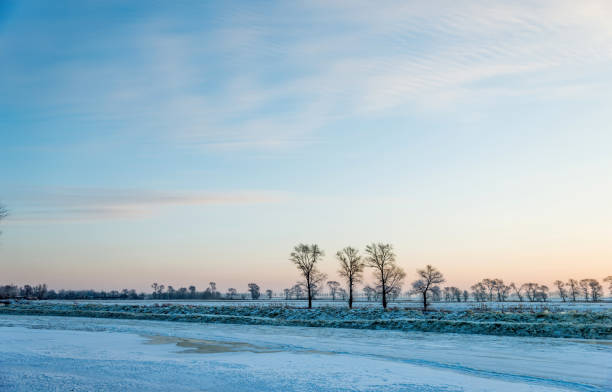 istock Winter landscape with frozen lake 1009506220