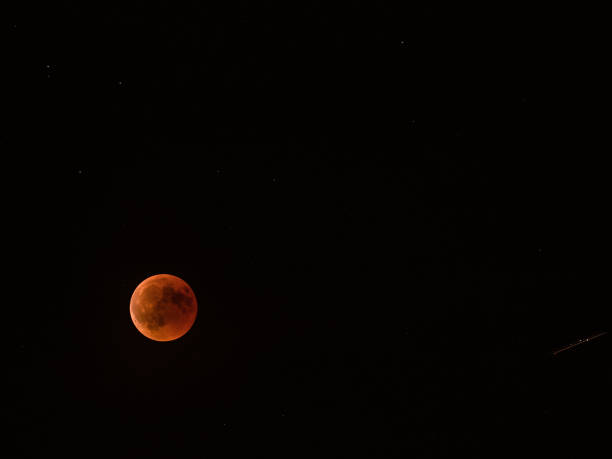istock Lunar eclipse red full moon, outstanding event occurred on july 27, 2018 1009508370