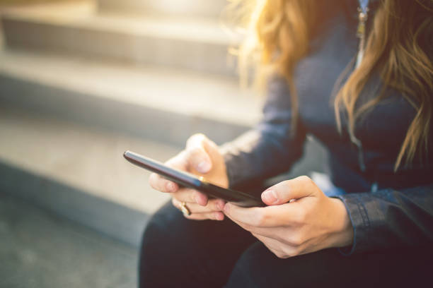 istock Hands of young caucasian woman using tablet. Close up. 1009521318