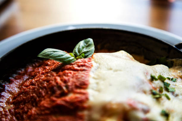 Lasagna is a traditional Italian meal that can be stuffed with beat, pork or vegetables like spinach and cheese. Usually accompanied with tomato sauce. It is nowadays a staple home made meal enjoyed the world over.