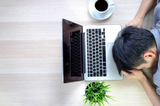 istock Businessman stressed because of work problems and profit losses 1009529742