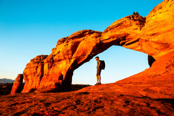 istock Hiker standing in Turret Arch 1009530564