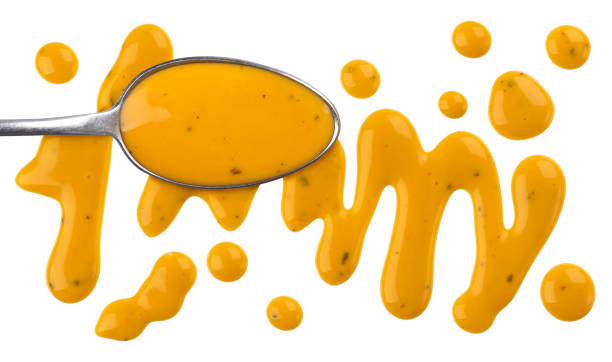 istock Honey mustard sauce isolated on white background 1009530576