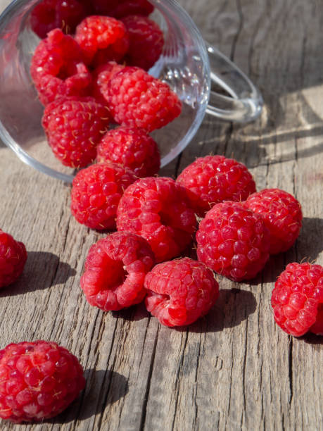 istock The raspberries scattered from the glass 1009533362