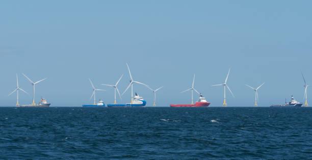 Offshore wind farm near Aberdeen, Scotland Oil support boats moored offshore from Aberdeen, near the wind farm aberdeen scotland photos stock pictures, royalty-free photos & images