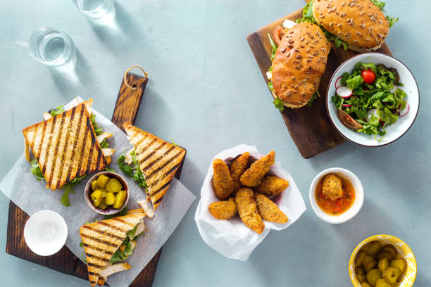istock Grilled sandwich with nuggets top view 1009541908
