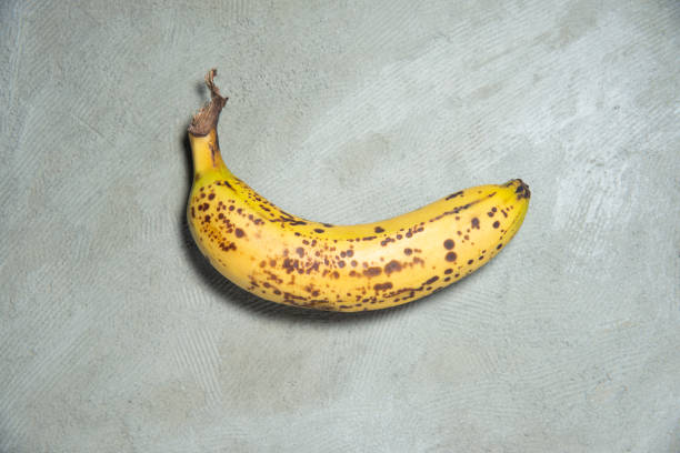 istock Banana. Over ripe bananas on Stone slate 1009542118