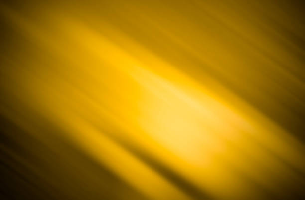 istock Gold background  black background background image with diagonal light black and gold. 1009551758