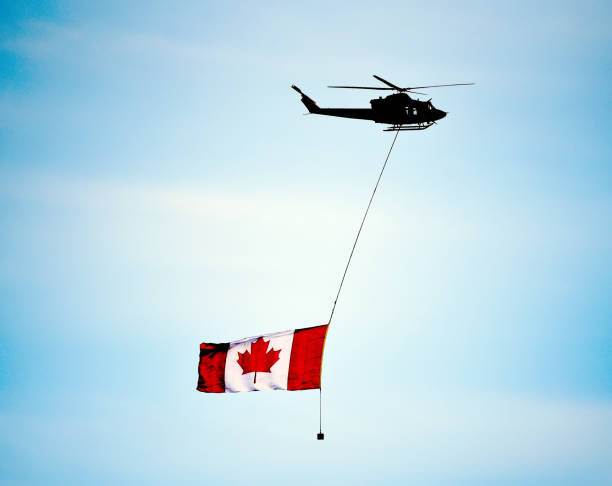 A helicopter evacuates an injured crewman on a stretcher, English Channel rescue.