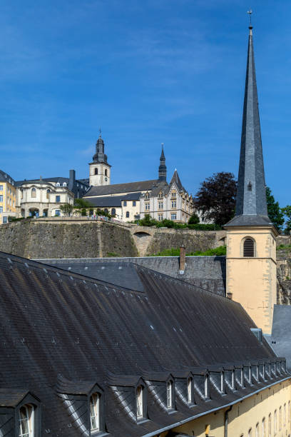 Luxembourg City - Grand Duchy of Luxembourg - Europe Luxembourg City - Ville de Luxembourg. The walls of the old town viewed from the Grund area of the city. petrusse stock pictures, royalty-free photos & images