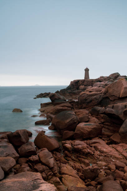 Long exposure view of the Ploumanach lighthouse. stock photo