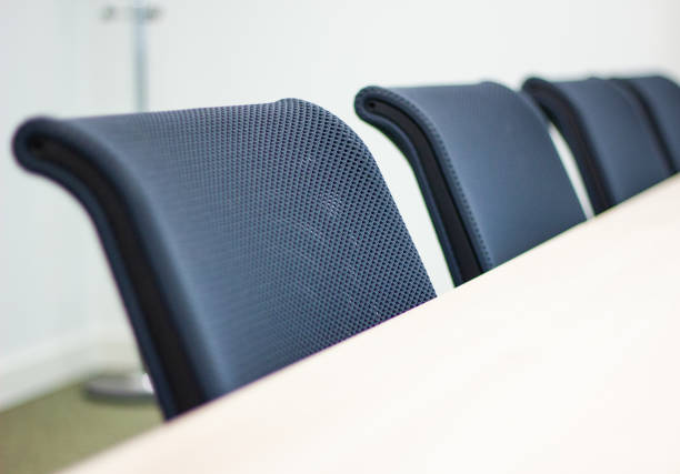 istock Row of office chairs 1009564946