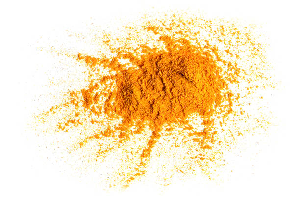 istock Turmeric (Curcuma) powder pile isolated on white background, top view. 1009568682
