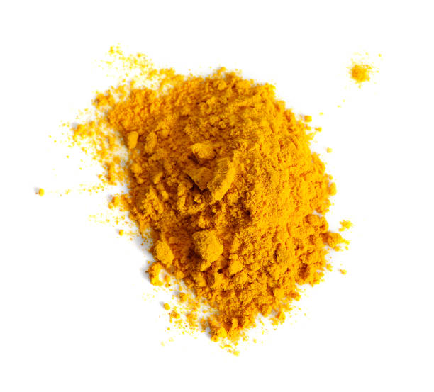 istock Turmeric (Curcuma) powder pile isolated on white background, top view. 1009568690