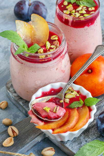 istock Homemade plum ice cream with pistachios and mint. 1009584204
