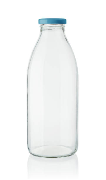 istock Milk bottle isolated on the white 1009600252