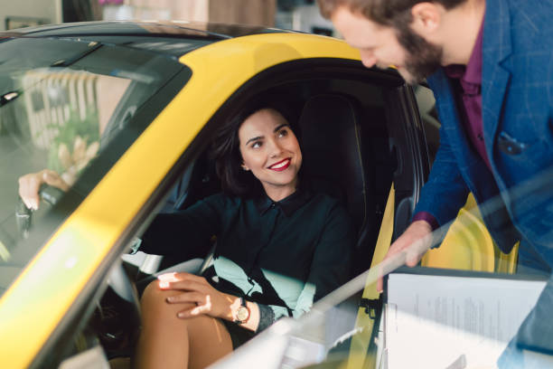 istock Woman enjoying new car 1009611916