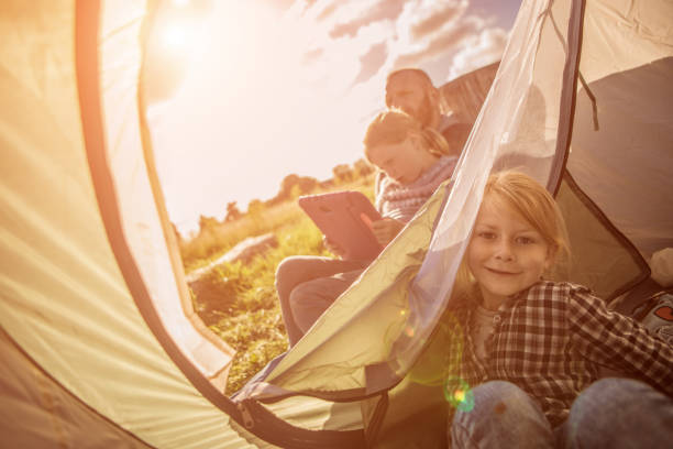 istock A blonde girl on a sunny spring camping trip 1009619714