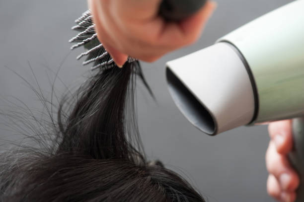 istock Drying black hair after dying 1009622946
