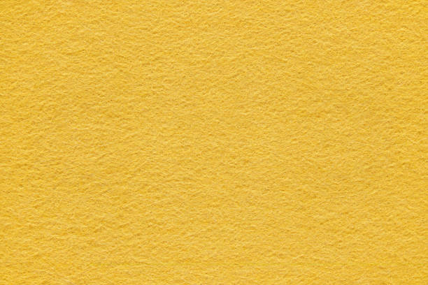 Yellow felt texture and background Yellow felt surface extreme close up. Large macro texture and background felt stock pictures, royalty-free photos & images