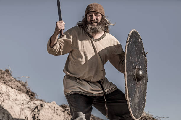 istock An individual viking warrior in action on a sandy battlefield dune 1009626474