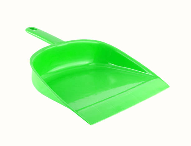 istock closeup green dust pan isolated on white background 1009629194