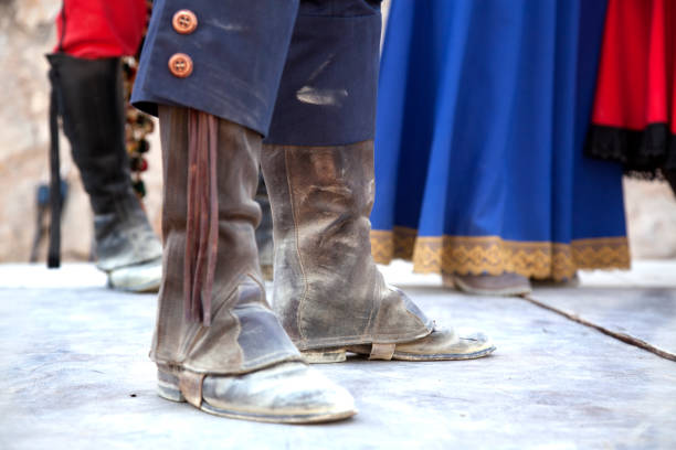 istock boots, pants and skirts representing Ronda bandits in Andalusia, Spain 1009629342