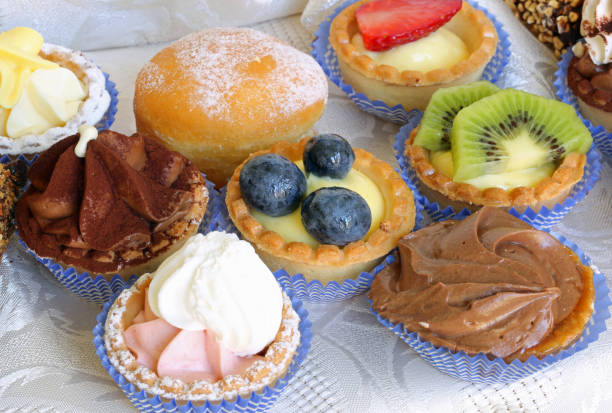 istock Background of many pastries with custard and fresh fruit 1009632620